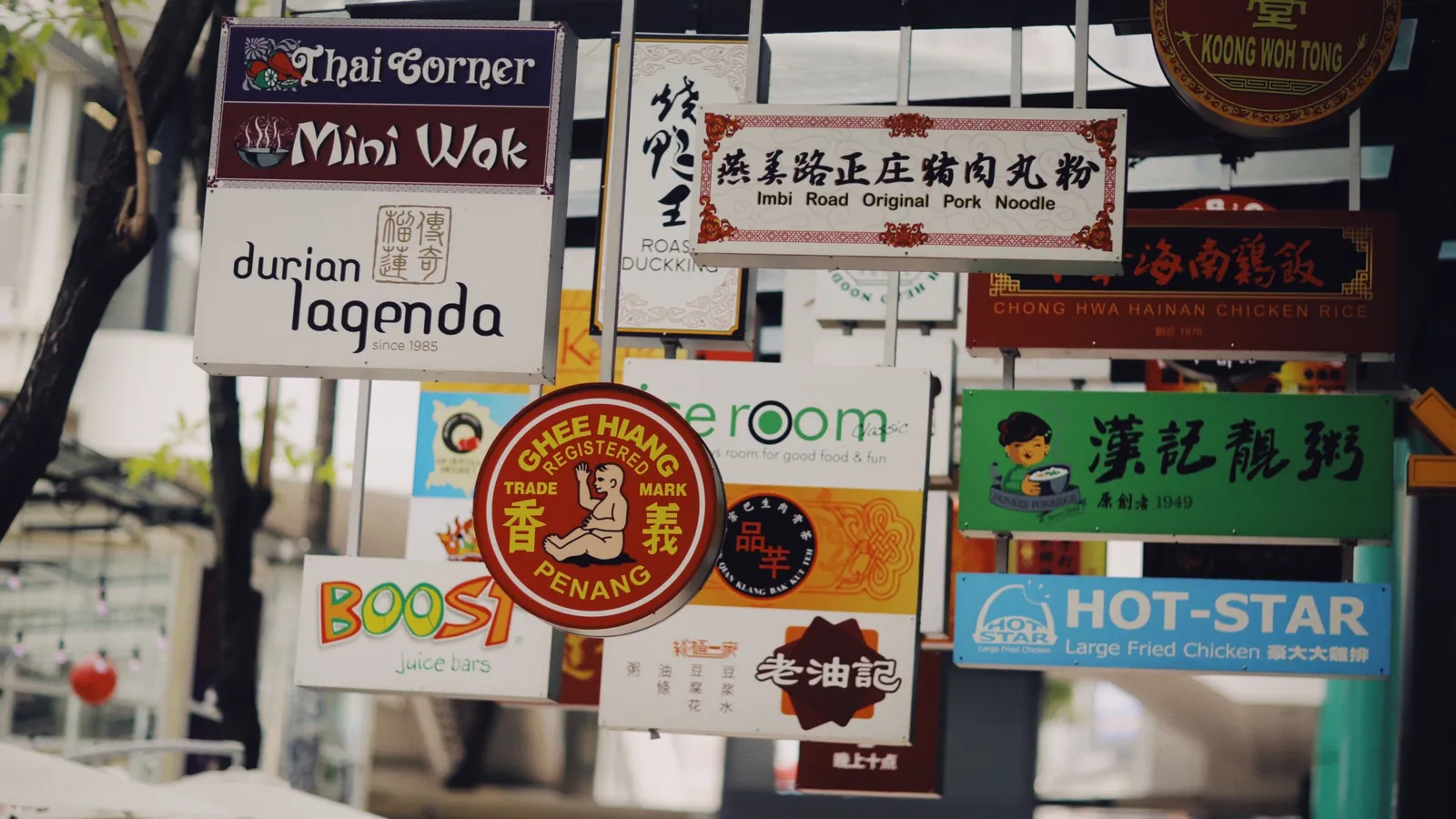 Street of shop signs written in English and Chinese